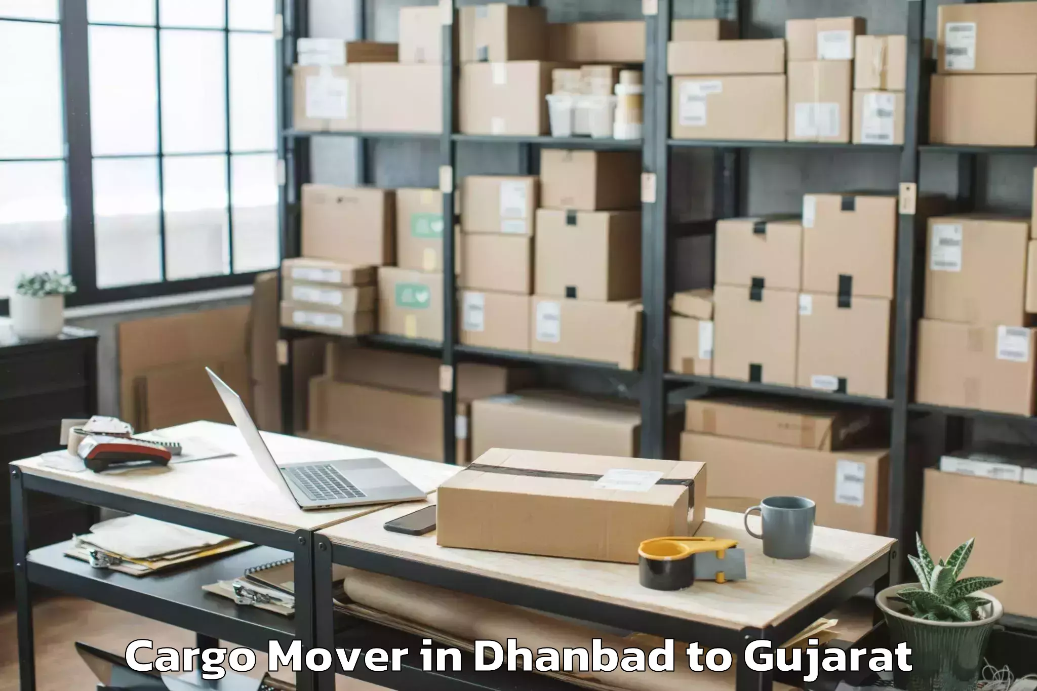 Reliable Dhanbad to Waghai Cargo Mover